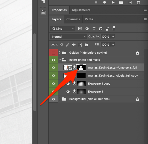 In the Layers panel, select the mask layer on the top portrait layer in Photoshop