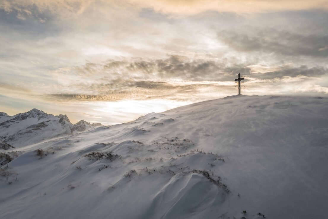 Monument on a snowy hilltop