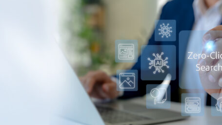 Zero-Click Search and AI Driven Answers. A professional taps a virtual Zero-Click Search interface. AI powered instant answers, automation, smart data processing and seamless digital interaction.